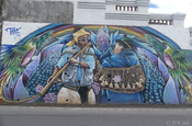 Vaquero mit Cholita Mural in Ecuador