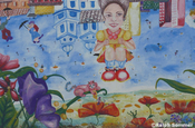 Mural Mädchen mit Blumen in Ecuador