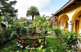 Garten und Bungalow der Hostería Sommergarten